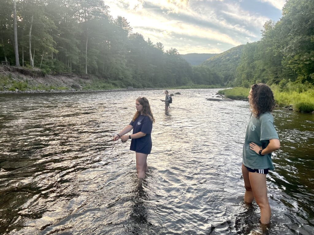women fly fishing Esopus Creek